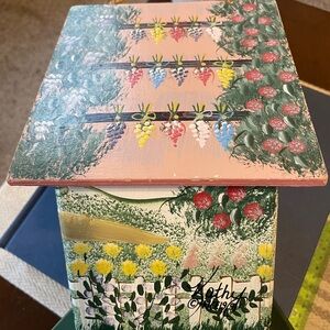 Vintage Hand Painted Birdhouse with garden view